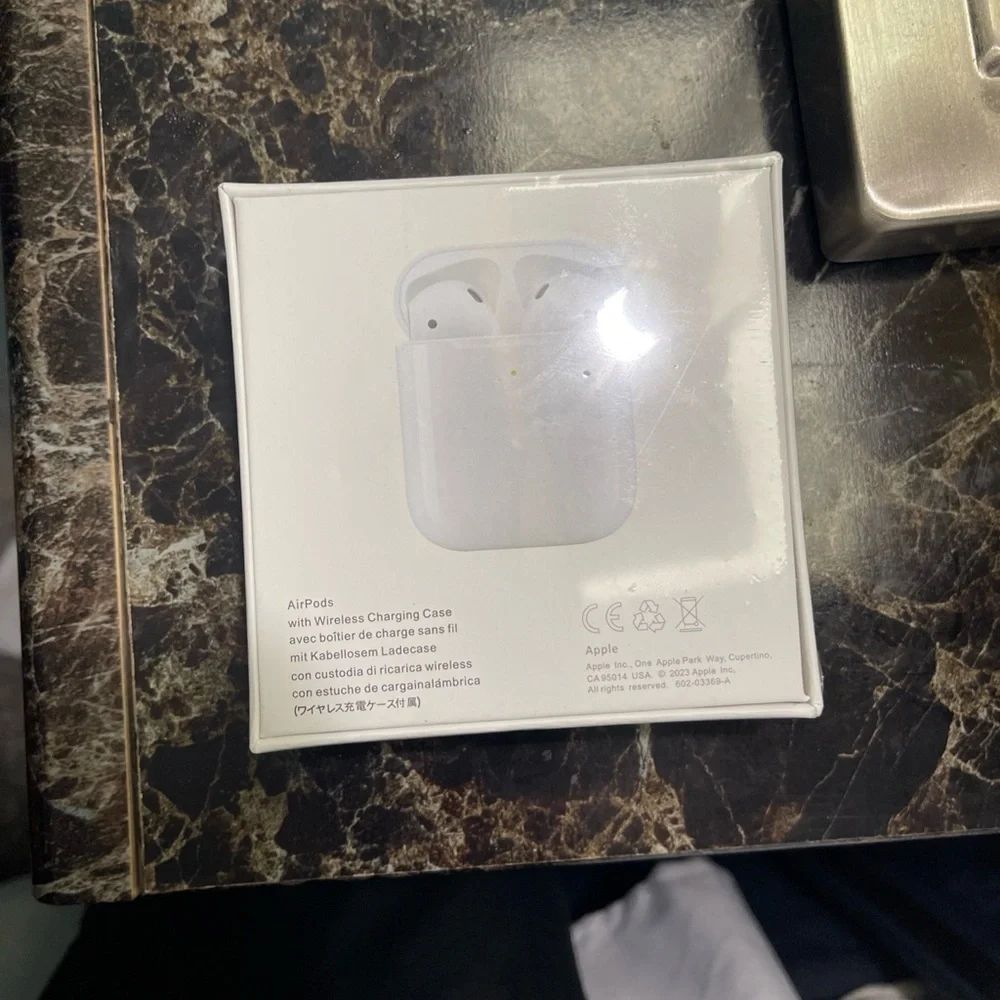 Apple AirPods with Wireless Charging Case - Classic White